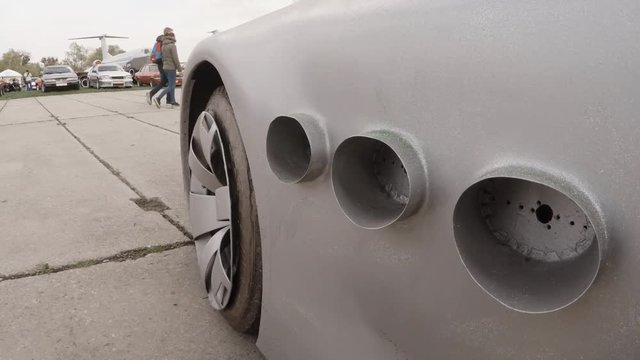 Modified Exhaust Pipes of Silver Mercedes Car