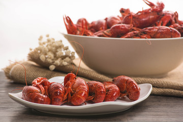 boiled big crawfish on the wooden surface