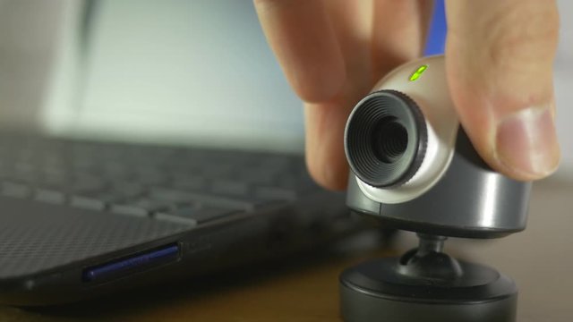 Installing a webcam Internet camera pluged to a laptop pc computer.
