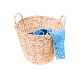 Obraz premium Clothes on wicker baskets for washing preparations whit white background