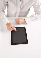 hands holding and pointing on contemporary tablet