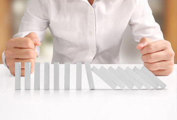 hand stop  dominoes continuous toppled