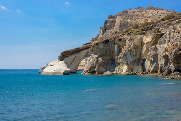 Fototapeta na wymiar Arched rock formation, Gerontas beach, Melos Greece