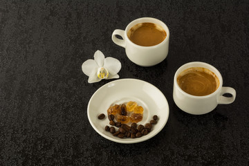 Coffee mugs and coffee beans
