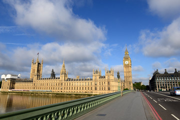 Obraz na płótnie Canvas LONDON - JUNE 28, 2015 : View of the Westminster Bridge and Big Ben, the Palace of Westminster, the icons of England, capital of UK, Europe. June 28, 2015 in London, UK.
