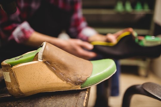 Focus on foreground of a pattern of shoes