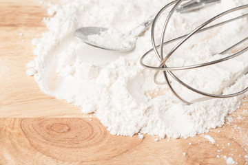 Flour and whisk prepare for cooking or baking