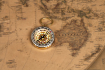 vintage compass on old map