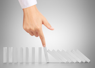 hand stop  dominoes continuous toppled