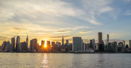 Naklejka na ściany i meble New York City Manhattan buildings sunset