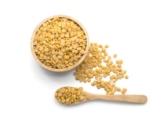 Soy beans on wooden bowl and spoon on white background 