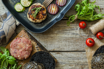 Preparing black burger and ingredients