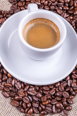 Cup and coffee beans