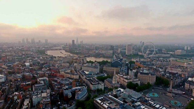 4K Aerial View Of Beautiful Sunrise at The City of London Skyline Iconic Landmarks and Famous London Skyscrapers Ultra HD