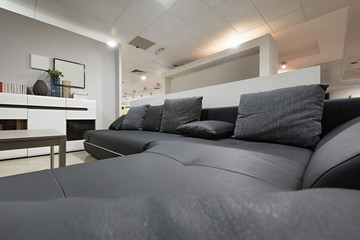 Black leather sofa in living room