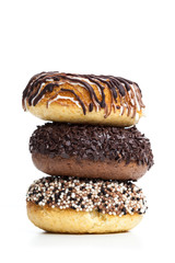 various donuts on white background