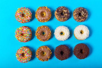 Assorted donuts on a blue background