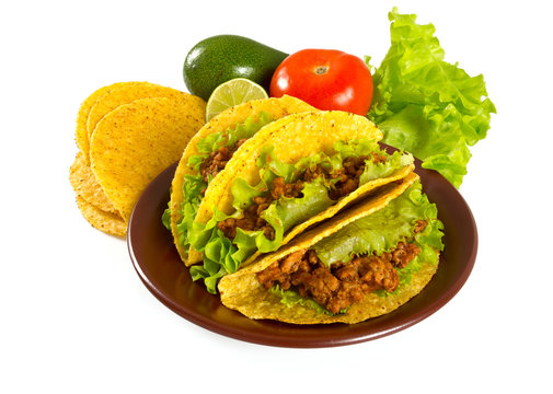 plate with tacos and nachos isolated on white