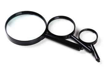 Three magnifiers over white