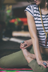 Young woman practicing yoga.
