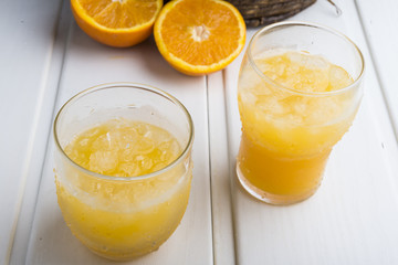 Fototapeta na wymiar Orange juice ice