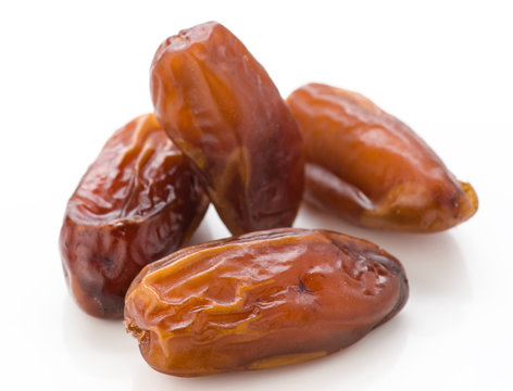 small group of tropical datils, on white