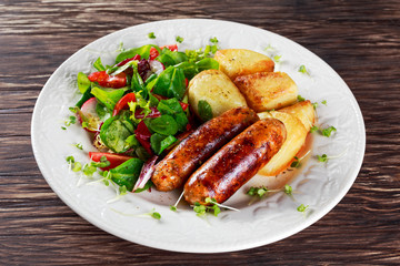 Roasted Sausages with Chips and Mix Vegetable salad
