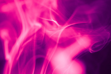 Pink and purple smoke abstract dark background