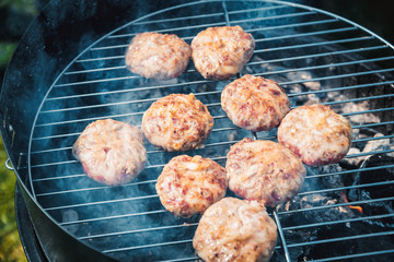 burgers on the grill, barbecue burgers Camping