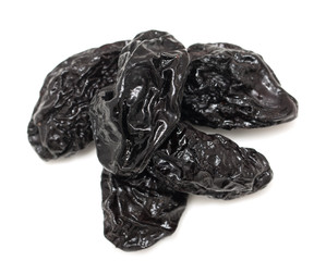 Prunes on a white background