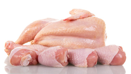 Raw chicken legs isolated on white.