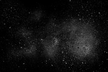 Fototapeta na wymiar White abstract powder explosion on a black background