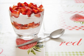 Strawberry dessert with spoon