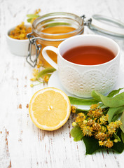 cup of herbal tea with linden flowers