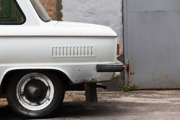 old car on the background wall of a building