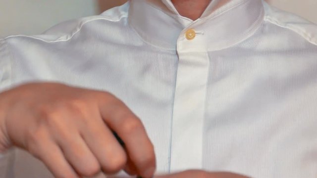 Man Shows How to Tie a Necktie