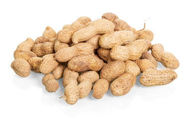 Peanuts unpeeled close-up isolated on white.