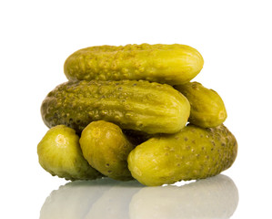 Pickled cucumbers close-up isolated on white.