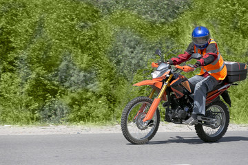 Fototapeta na wymiar motorcyclist biker fast riding
