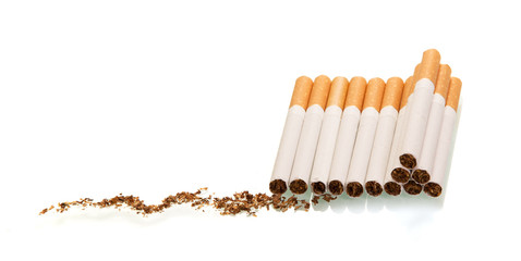 Lots of cigarette tobacco isolated on white.