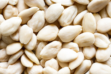 Background of peeled whole almonds.