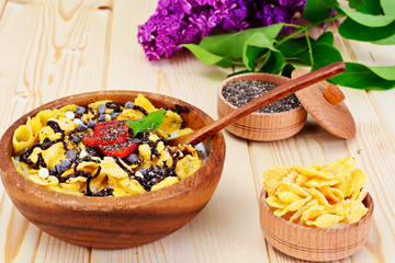 Cornflakes with Strawberry and Chocolate. Healthy Breakfast