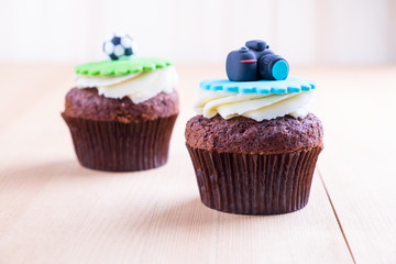 Delicious cupcakes on table