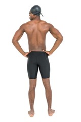 Rear view of swimmer on white background