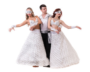 Fototapeta na wymiar Three carnival dancers wearing a mask dancing, isolated on white