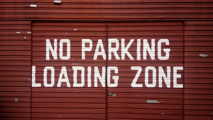 No parking loading zone sign