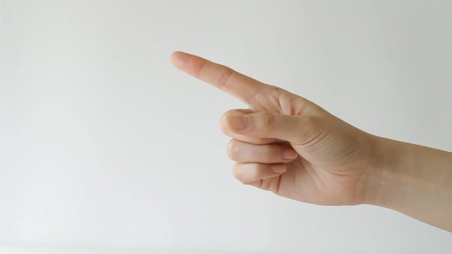 Woman's finger pointing or touching on white background 