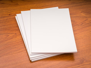 Blank catalog, magazines,book mock up on wood background..