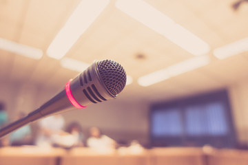 Black microphone in conference room ( Filtered image processed v