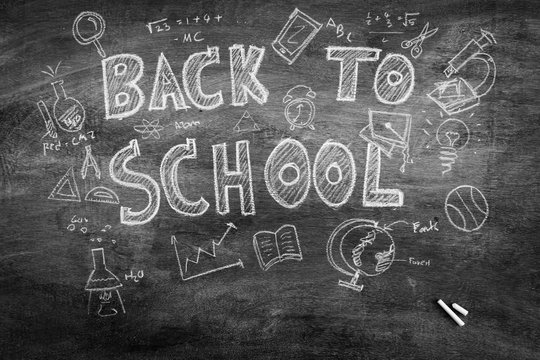 Freehand drawing Back to school on chalkboard ,Filtered image pr